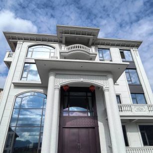 榆林白麻别墅外墙干挂石材效果示例