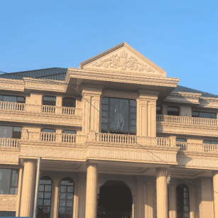 榆林黄金麻别墅外墙干挂石材效果示例