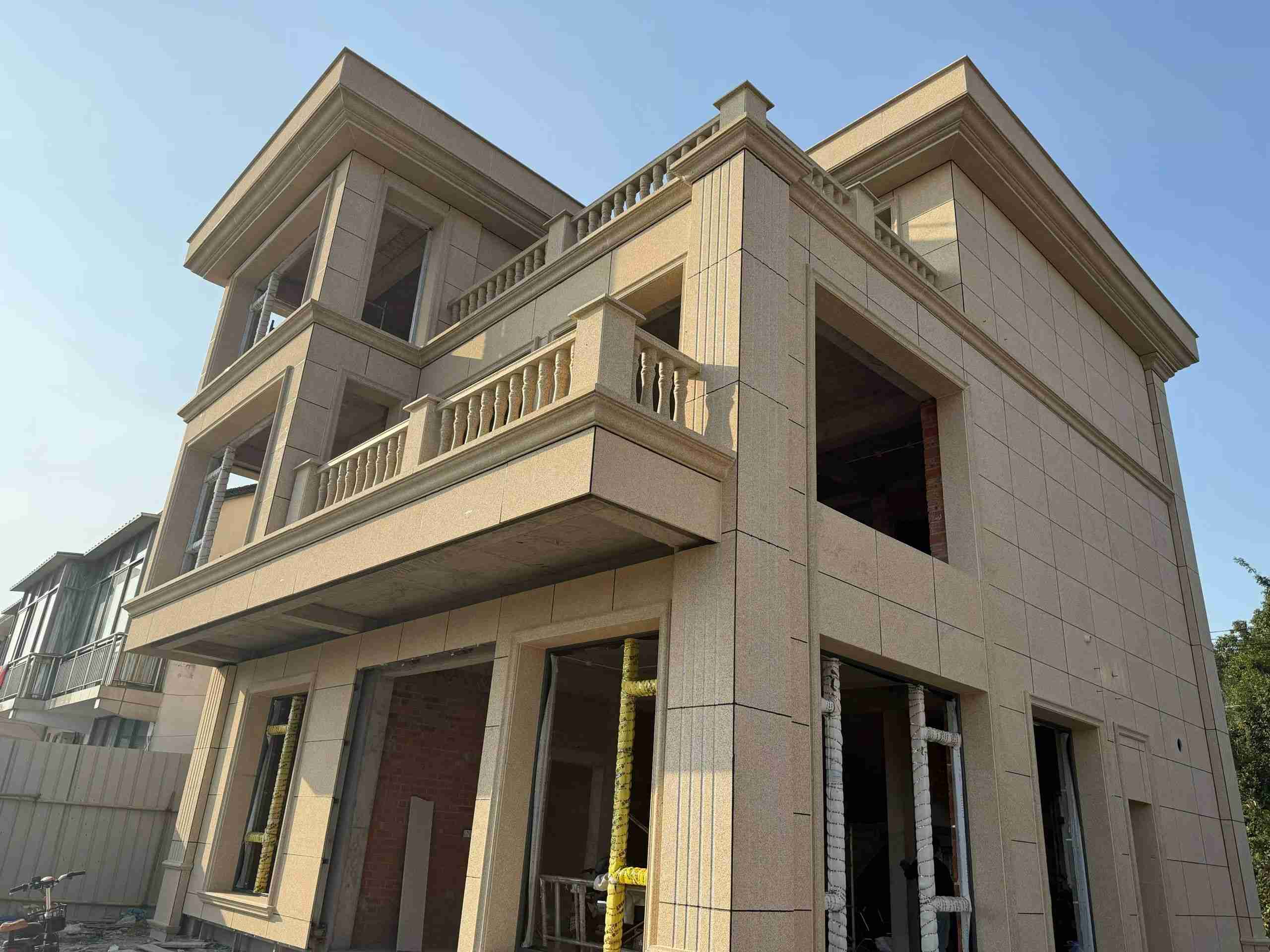 榆林 黄金麻花岗岩石材荔枝面外墙干挂效果展示